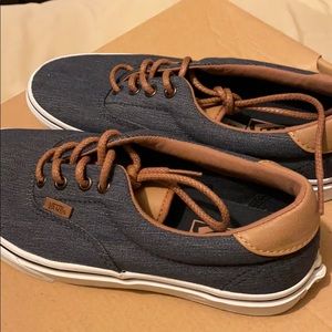 Vans. Women’s 7.5, Men’s 6